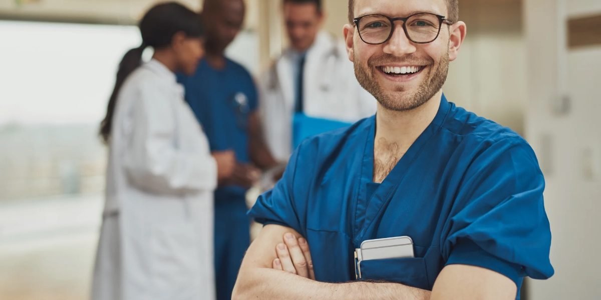 smiling male clinician 1200x620